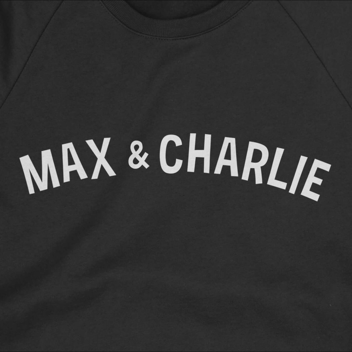 team-black-sweatshirt-front-closeup